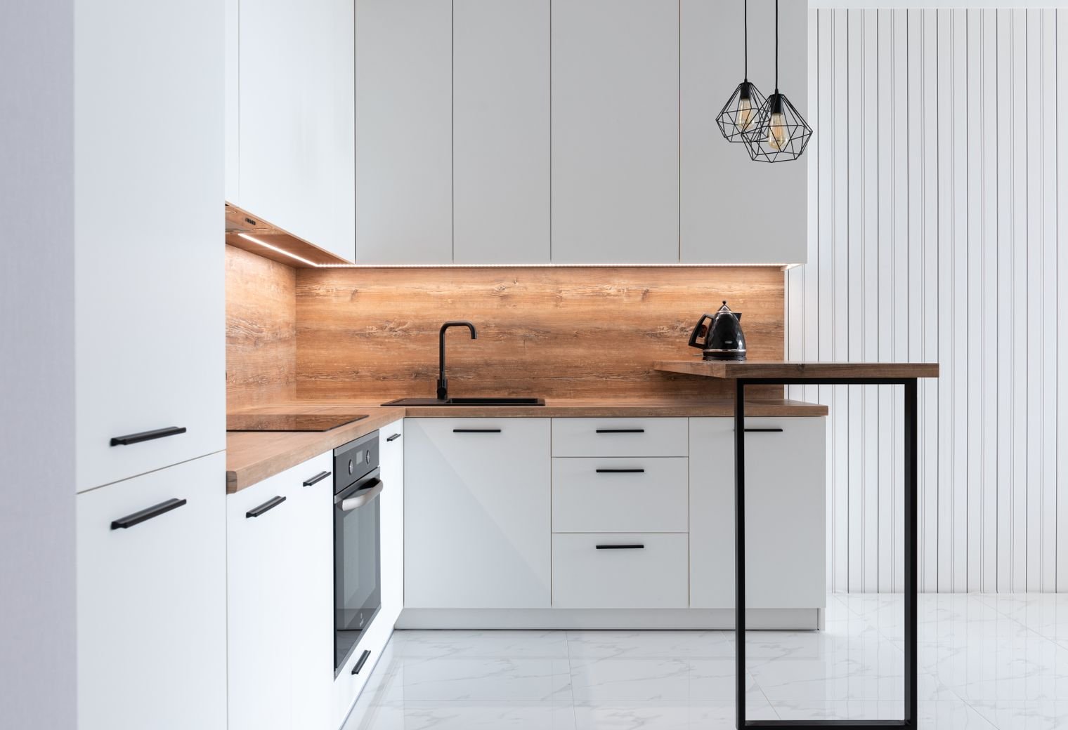 fresh bright kitchen with clean counters and simple decor
